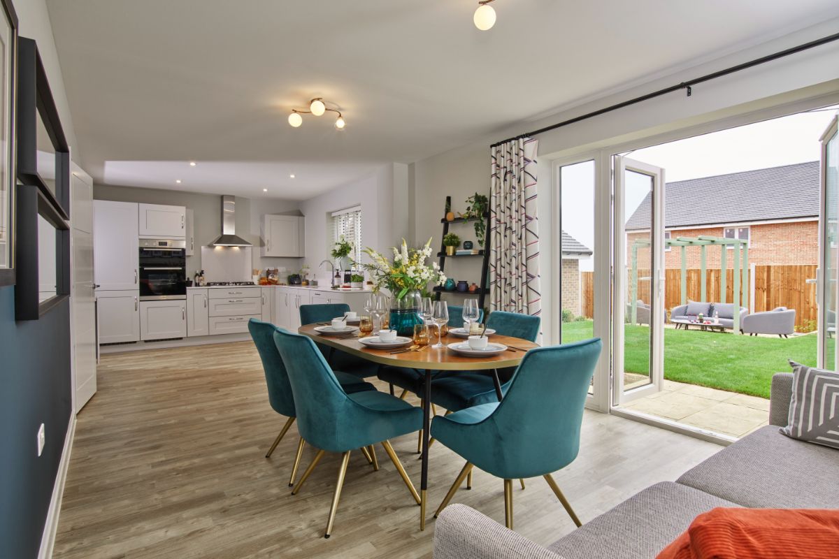 The Dorking show home open plan kitchen/dining room at Claybourne