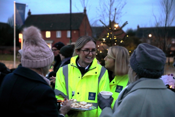 Crest Nicholson team handing out mince pies