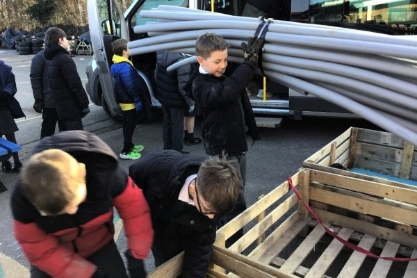 Children of Hernhill Primary unloading the minibus